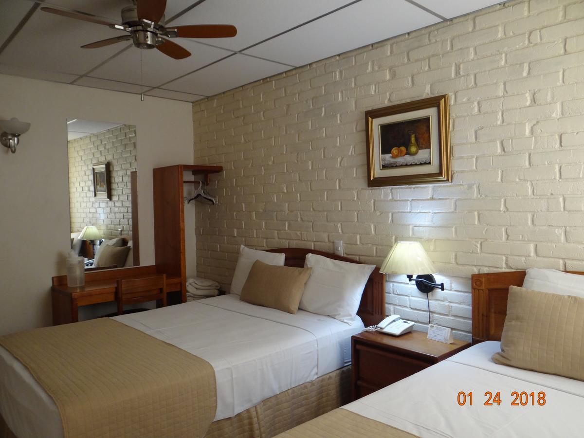 Hotel Mac Arthur Tegucigalpa Szoba fotó